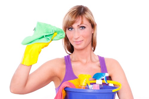 Cleaner preparing a safe workspace before starting cleaning tasks