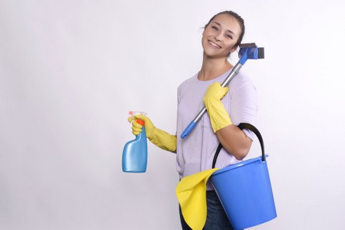 Local carpet cleaner preparing equipment in a Paddington property
